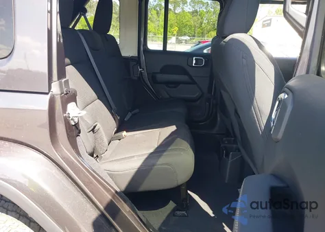 2022 Jeep Wrangler Unlimited Sahara 4X4 z USA, uszkodzony, nr VIN 1C4HJXEN2NW194502